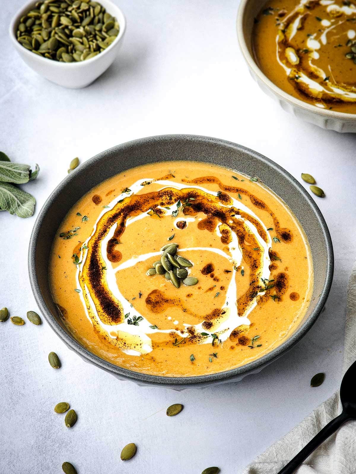 Roasted butternut squash soup drizzled with sage brown butter, and quick creme fraiche.